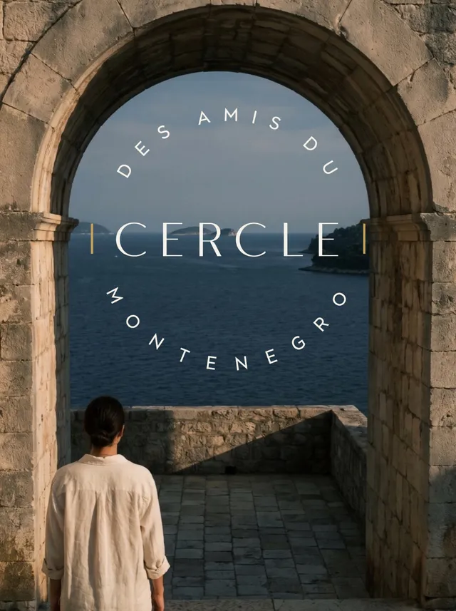 Cercle key visual: a woman in a linen shirt looking out through a stone arch at the Adriatic, with the Cercle des Amis du Monténégro wordmark across the sky.